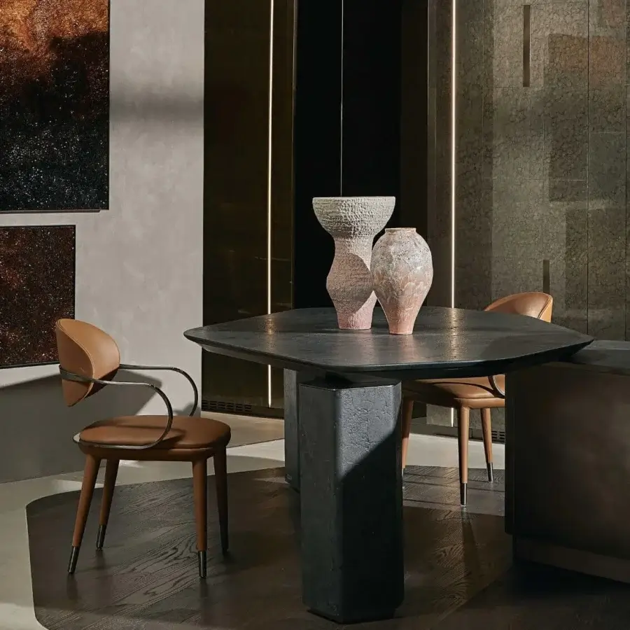 Contemporary Visionnaire Titan Table with polished marble top, matte black stone base, and central rectangular column