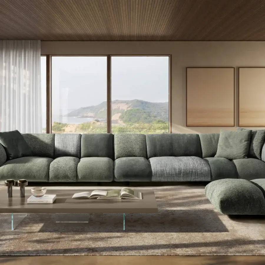 Luxury Lago Not Only White sectional in muted sage‑green with matte textile finish and deep padded cushions and low backrest.