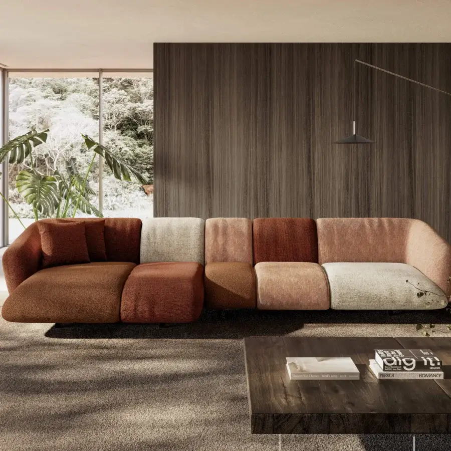 Prestige sectional upholstered in textured textile fabric with reddish‑brown, off‑white, rust‑red and pale beige blocks