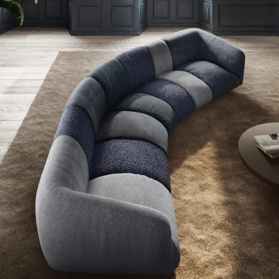 Luxury Lago Not Only White sectional upholstered in LAGO textile fabrics with monochromatic blue‑grey palette and serpentine silhouette