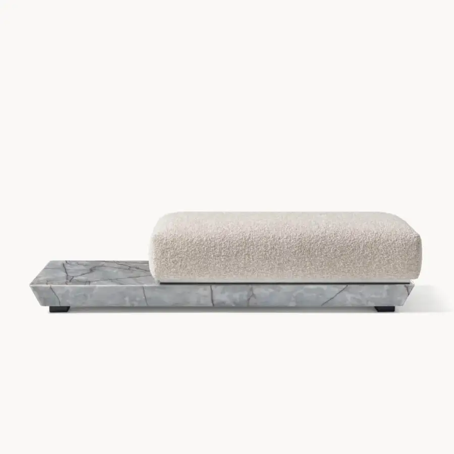 Luxury Visionnaire Prelude bench with polished stone plinth, off‑white cushion, stainless steel accents and dark wood frame