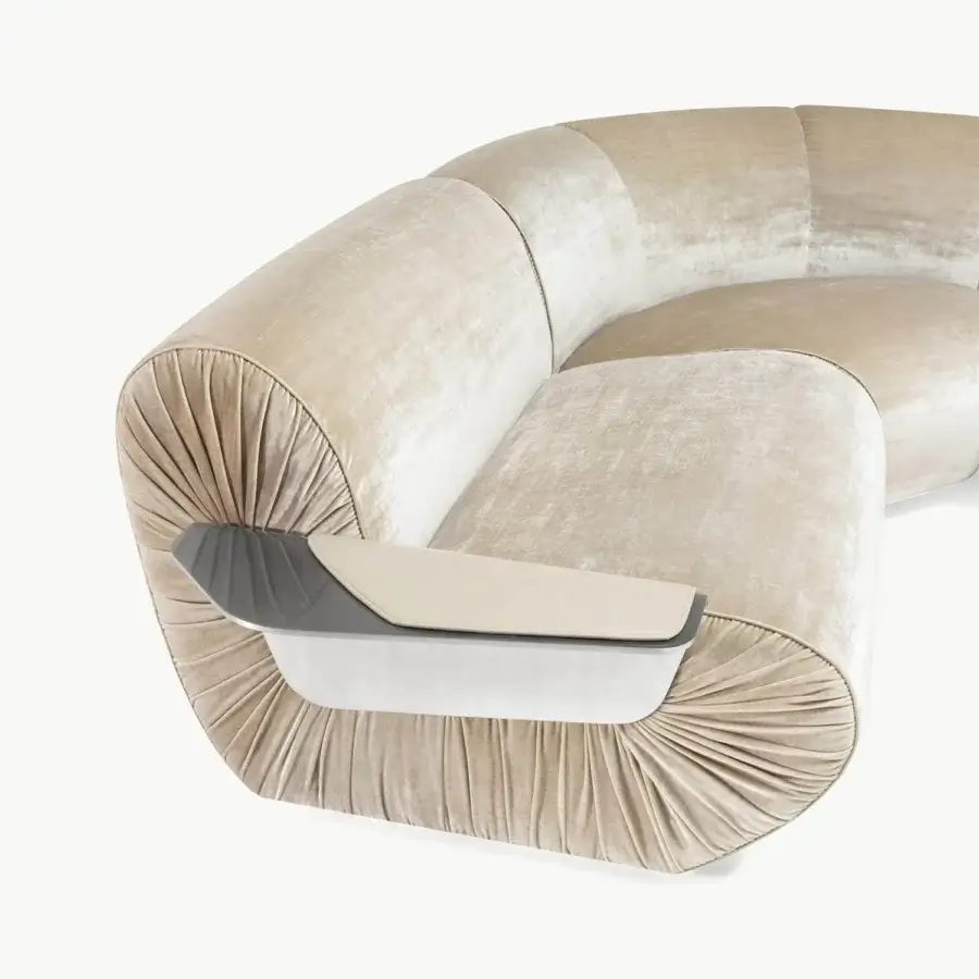Premium Visionnaire Joker sectional with champagne‑beige plush textile, satin‑like pleating, matte metal armrest insert