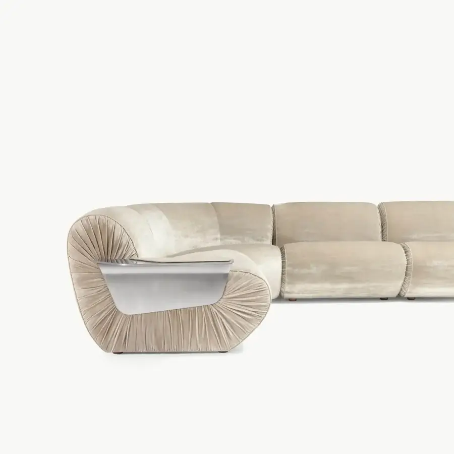 Luxury Visionnaire Joker sectional with pale beige textile and silver‑toned metal inserts featuring subtle reflective finish and built‑in metal tray