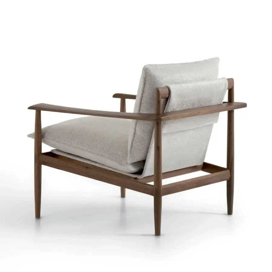 Luxury Giorgetti Kumiki lounge chair with canaletto walnut frame and matte finish, textile cushions and T-shaped backrest