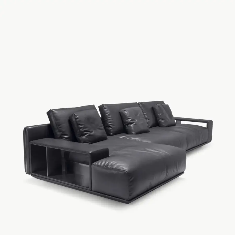 Luxe Visionnaire’s Frame Sectional with black leather upholstery, matte metal frame, profile segmented seat and chaise lounge