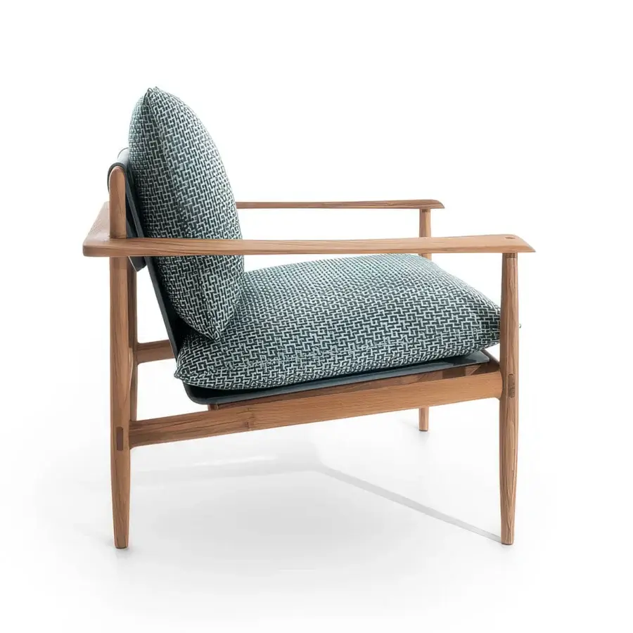 Meticulous Giorgetti Kumiki lounge chair in natural solid teak with exposed joinery and blue white patterned textile