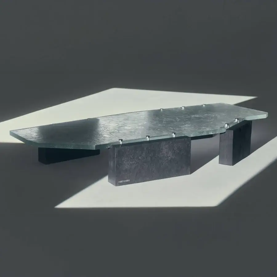 Sophisticated Visionnaire Stealth coffee table with light-grey textured glass and dark charcoal split Moltrasio stone