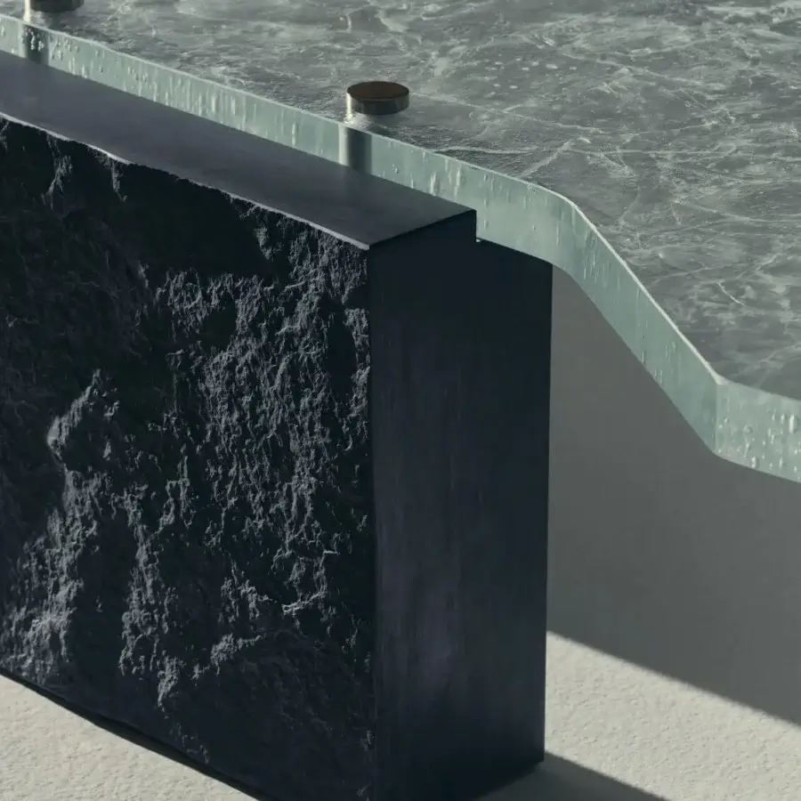 Elegant Visionnaire Stealth coffee table with translucent glass, charcoal Moltrasio stone base, and palladium-brass studs