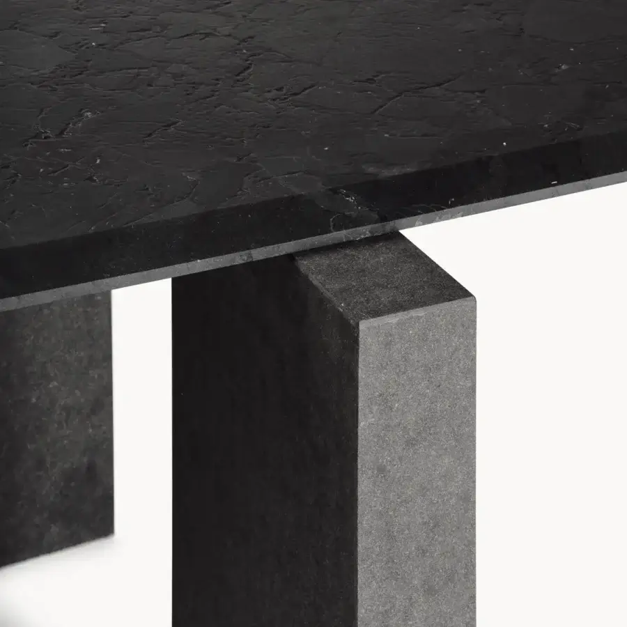 High-end Visionnaire Axiom table with stone top, textured leather, beveled edges, blocky bases on flamed Nero Zimbabwe plate