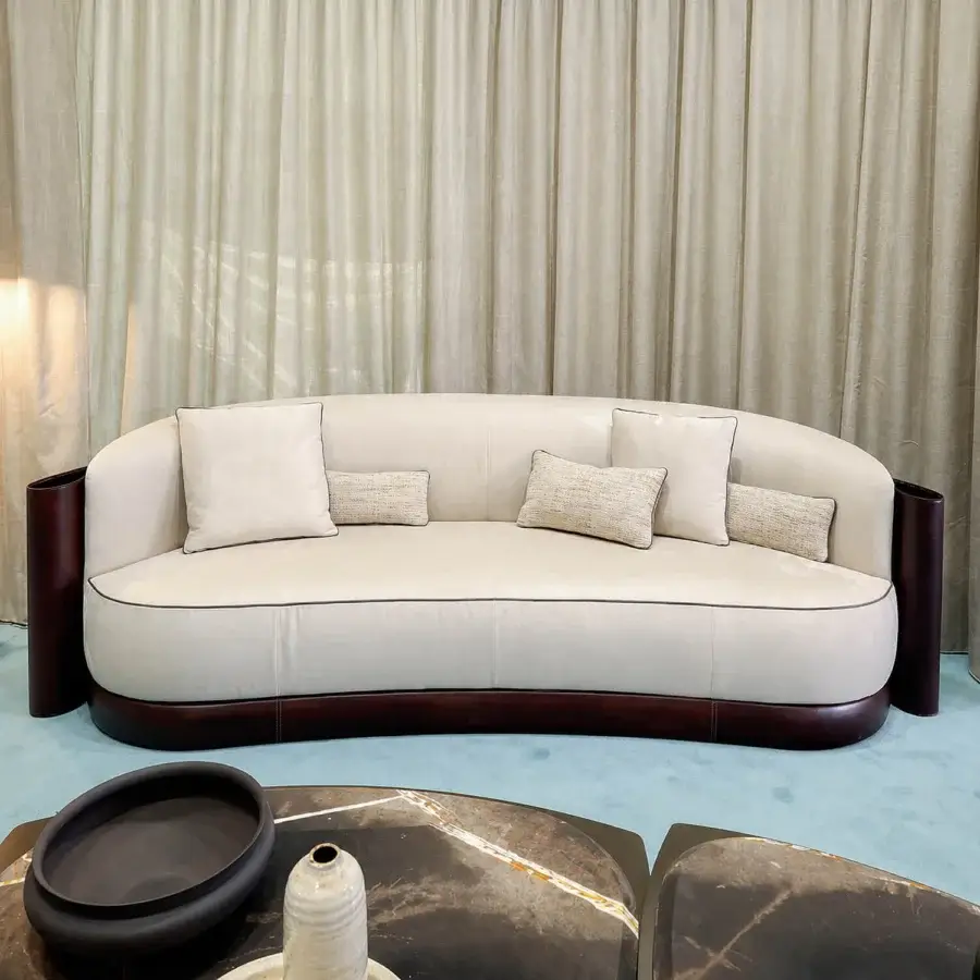 Refined Bellotti Ezio 2026-01 sofa in white matte Tecnabuk textile with dark brown hide base and decorative metal detailing
