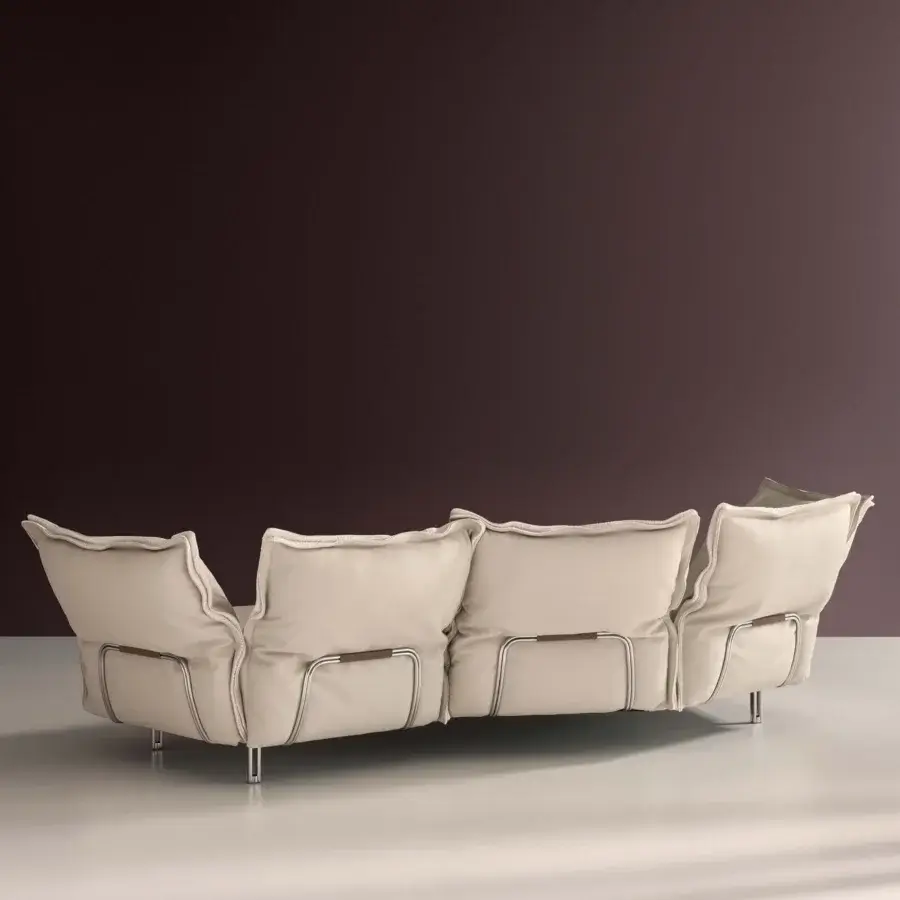 Elegant Nuvola sofa with frame in off‑white cream fabric, silver metal frame, brown straps, metal legs, contemporary silhouette