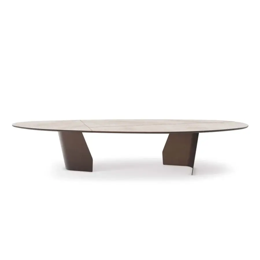 Elegant Cattelan Italia Senator Keramik Magnum table with matte off‑white ceramic top veined subtle beige and dark brown bronze pedestals