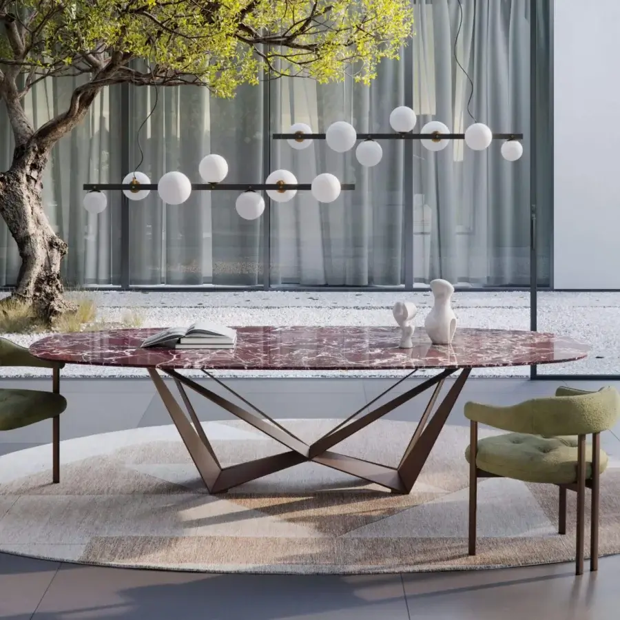 Premium Skorpio Marble table with polished stone top, matte dark bronze steel base, oval silhouette and burgundy veining
