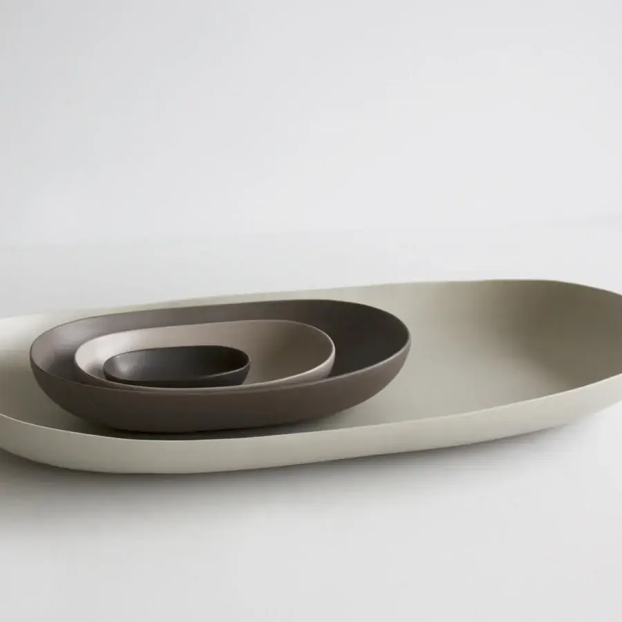 Luxury Rina Menardi centerpiece set with baked clay bowls in off‑white, dark brown, light beige, dark grey and matte finish