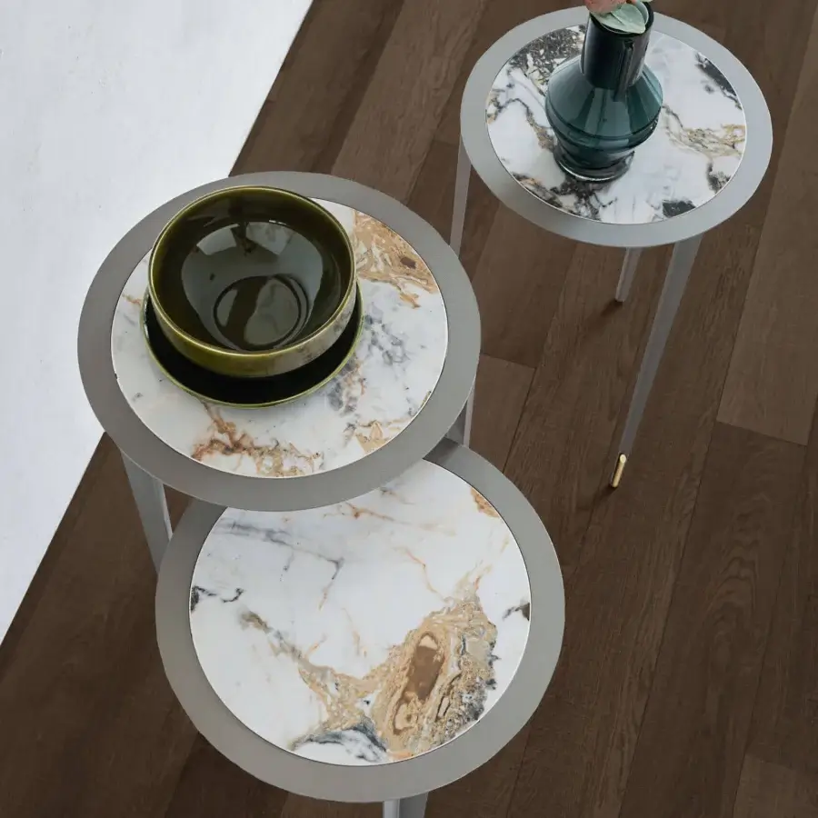 Premium Cattelan Italia Brio Keramik side tables with polished ceramic tops veined grey gold matte grey metal legs and golden foot caps