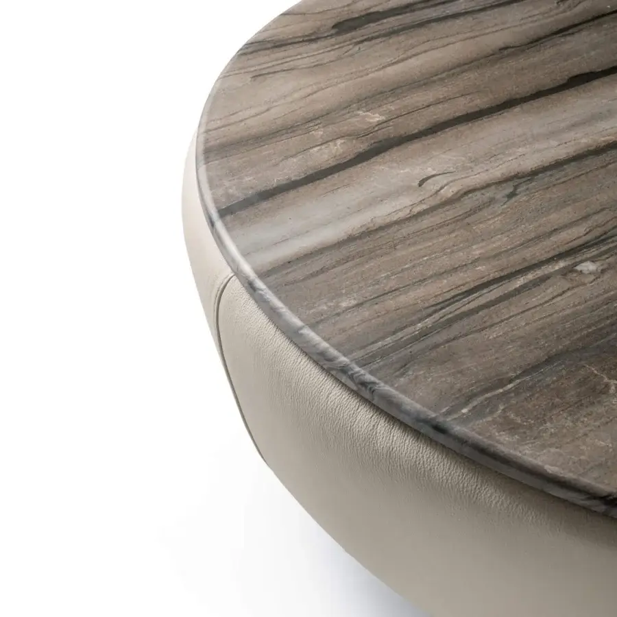 Luxury Deck coffee table by Ditre Italia with MDF top reflecting veined stone tones and beige leather‑like upholstered base