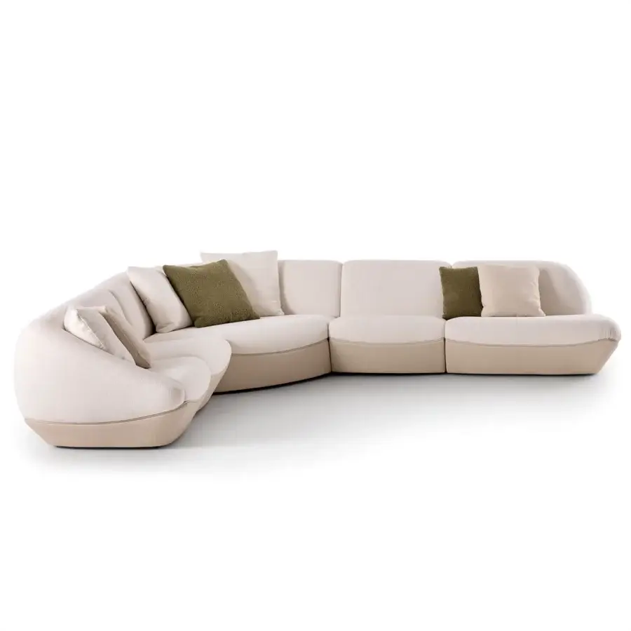 Balanced Rugiano Iside sectional with fluid curved lines in cream fabric and beige base accented by bronzed brass details