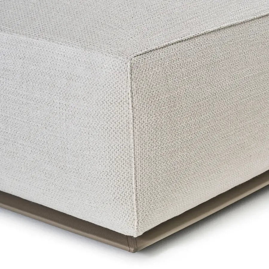 Luxury Rugiano Hatton sectional with low‑profile minimalist silhouette, light beige textile, and taupe leather‑wrapped base