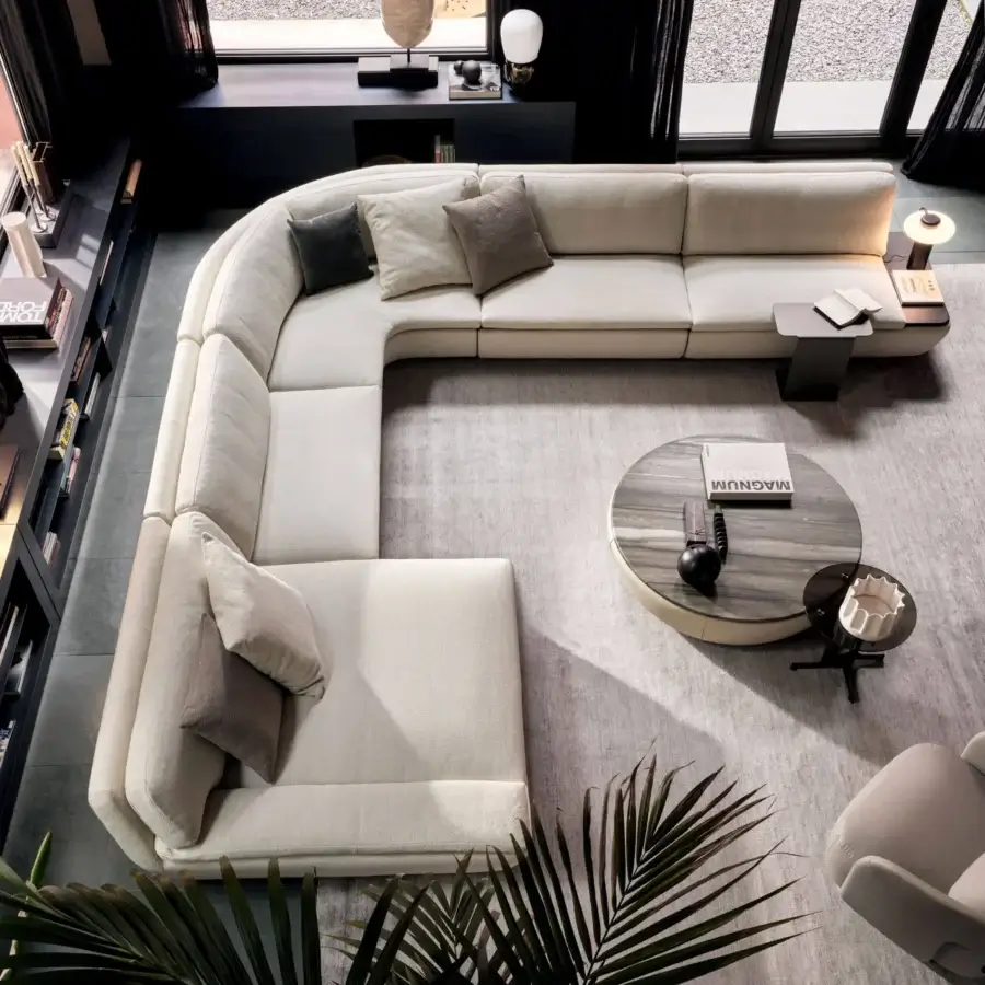 Sophisticated Ditre Italia Deck sectional with railroaded grain textured fabric, L‑shaped fir frame, charcoal pillows