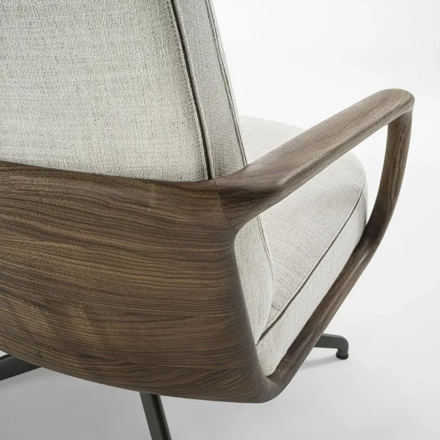 Prestige Porada Cuna lounge chair with medium‑to‑dark brown wooden shell, light‑gray textile cushions, and matte gray legs