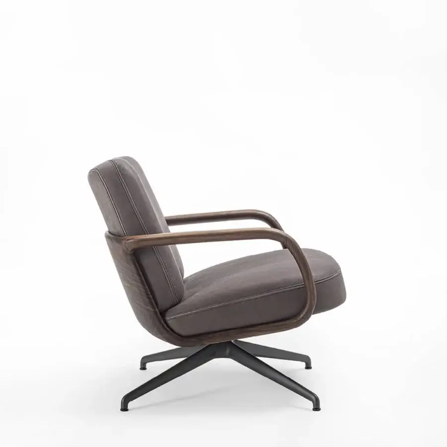 Exclusive Porada Cuna lounge chair with taupe‑brown upholstery, wooden shell, dark grain, matte black metal base