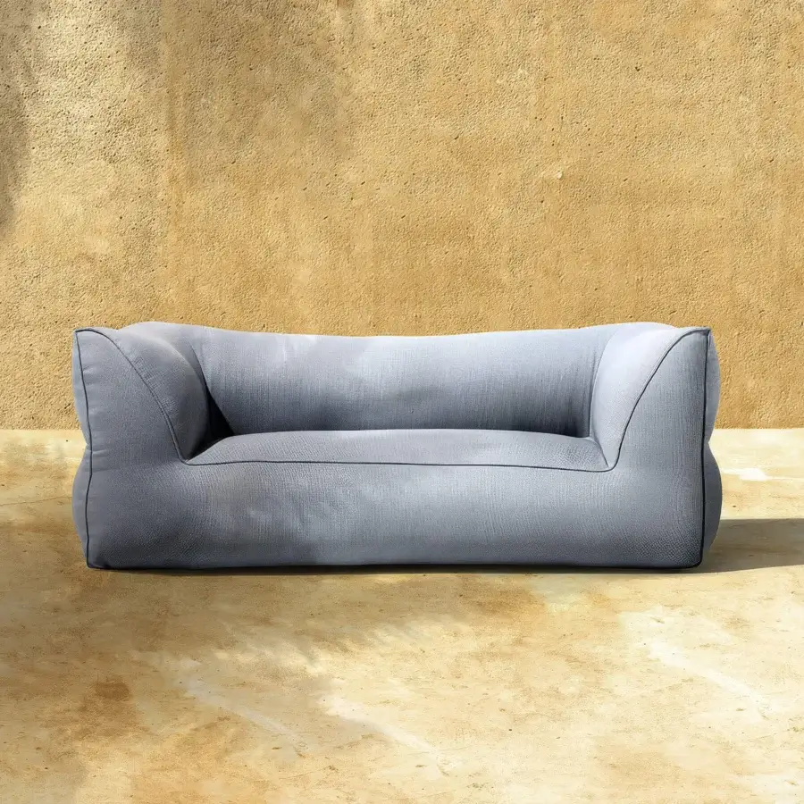 Luxury Gart Puffone sofa light grey‑bluish matte outdoor textile with integrated armrests and backrest resting on floor