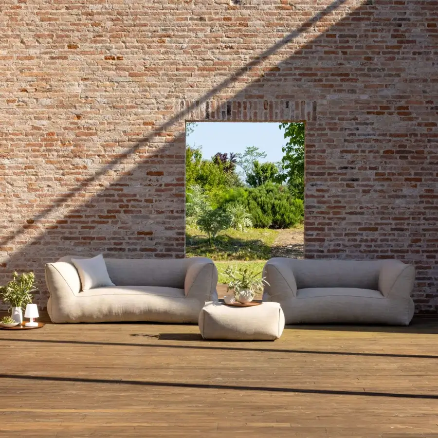 Elegant Gart Puffone sofa with uniform light‑beige matte outdoor textile and seamless non‑removable cover