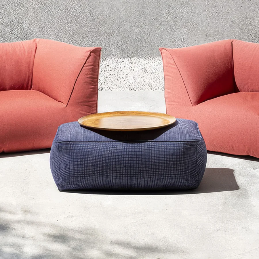Premium Gart Puffone sofa with low‑profile coral‑tinted silhouette, outdoor fabric, microsphere‑filled cushion, made in Italy
