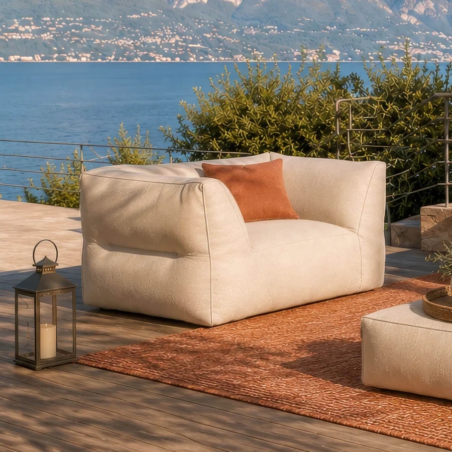 Premium Gart Puffone lounge chair in off‑white outdoor fabric with a cubic silhouette and softened rounded edges