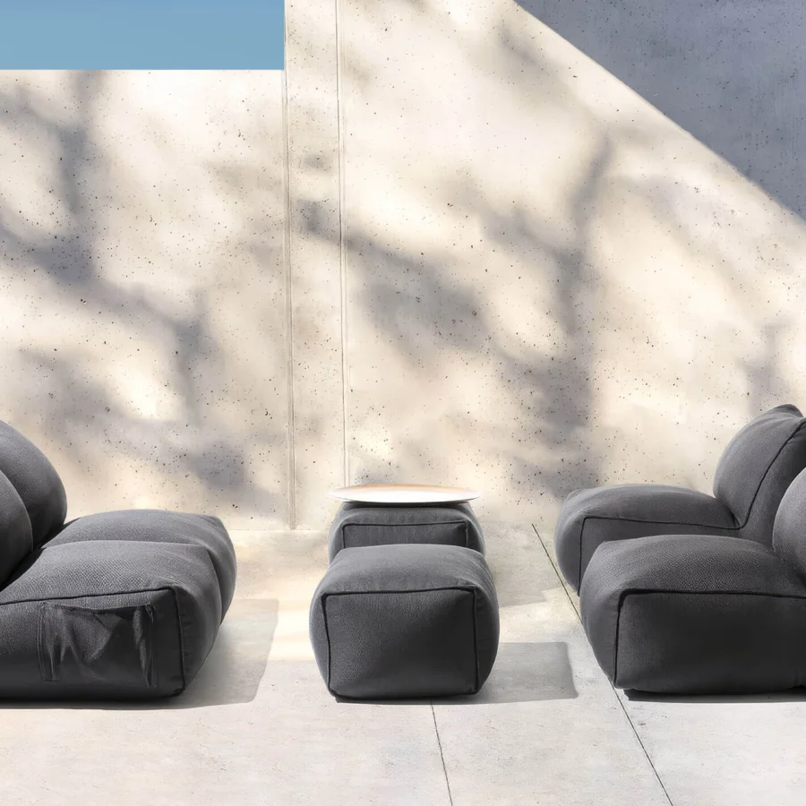 Sleek Gart Puffone Lounge Chair with Pocket matte dark grey high-performance outdoor fabric textured woven