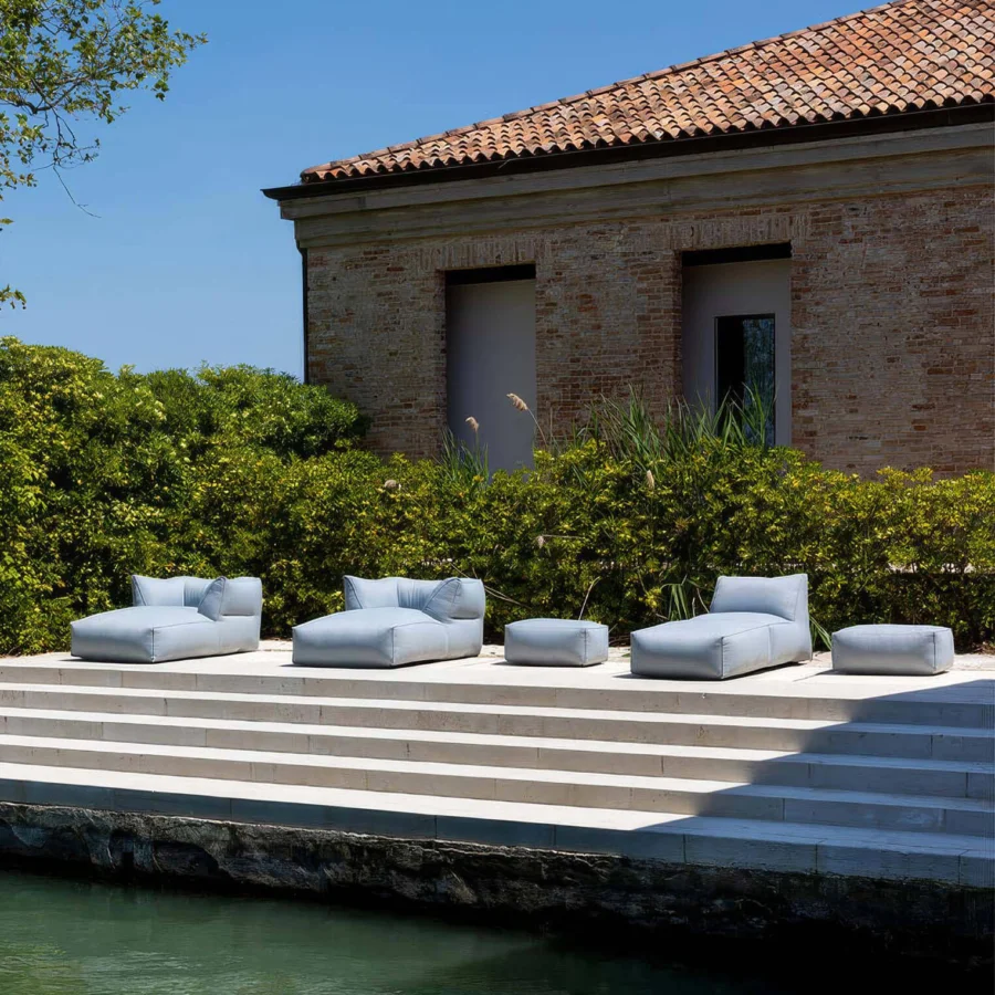 Premium Gart Puffone lounger with matte pale blue-grey high-performance outdoor fabric and integrated backrest