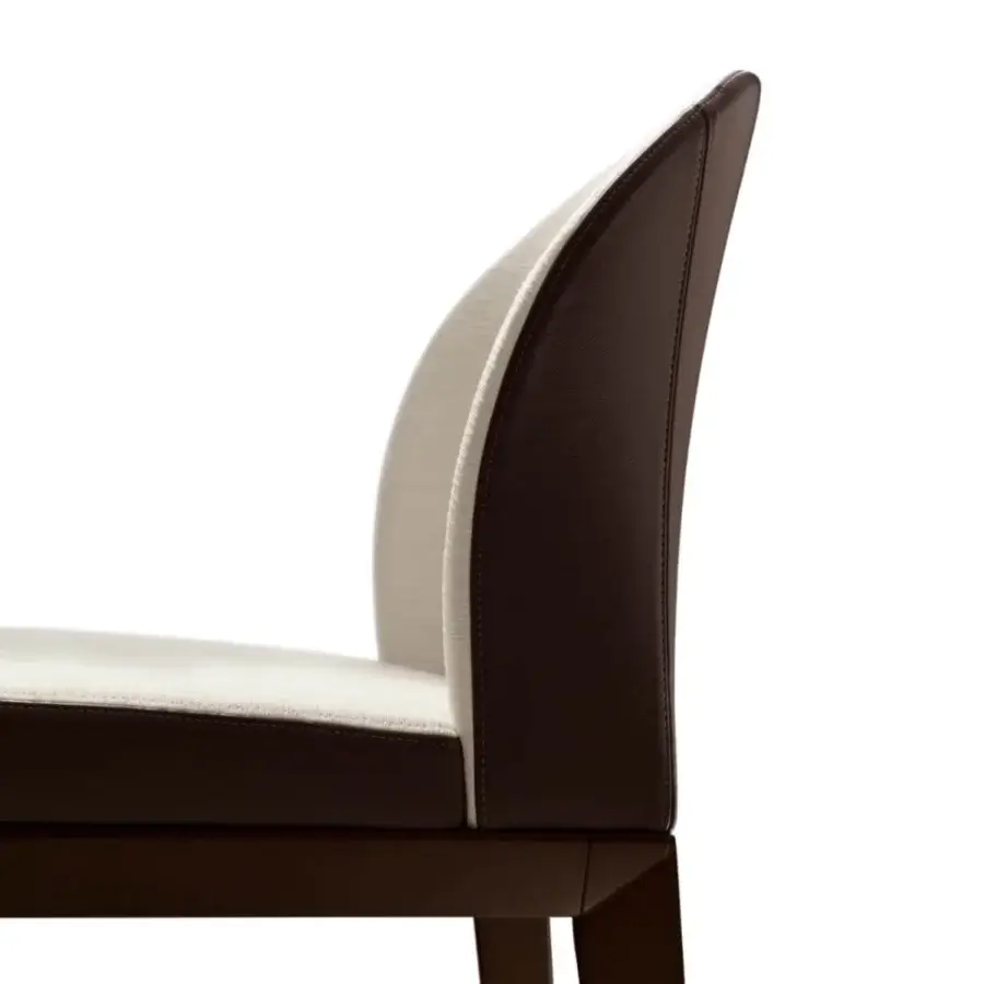 Stylish Giorgetti Normal armchair with dark brown leather exterior and off-white textile interior, built with a solid beech wood base