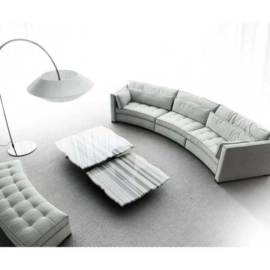 Lavish Erba Alchimia sectional with light gray textile upholstery, tufted seat cushions and dark contrasting trim