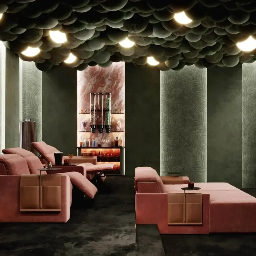 Distinguished Vismara Kubrik home cinema seating with double reclining mechanism upholstered in pinkish-red textile and tan box-like side tables