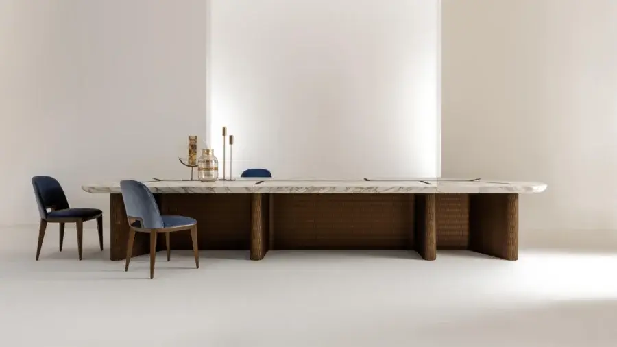 Exquisite Laurameroni Infinity table with creamy veined marble, burnished brass rosette and satin bronze ribbed Lacca 61 base