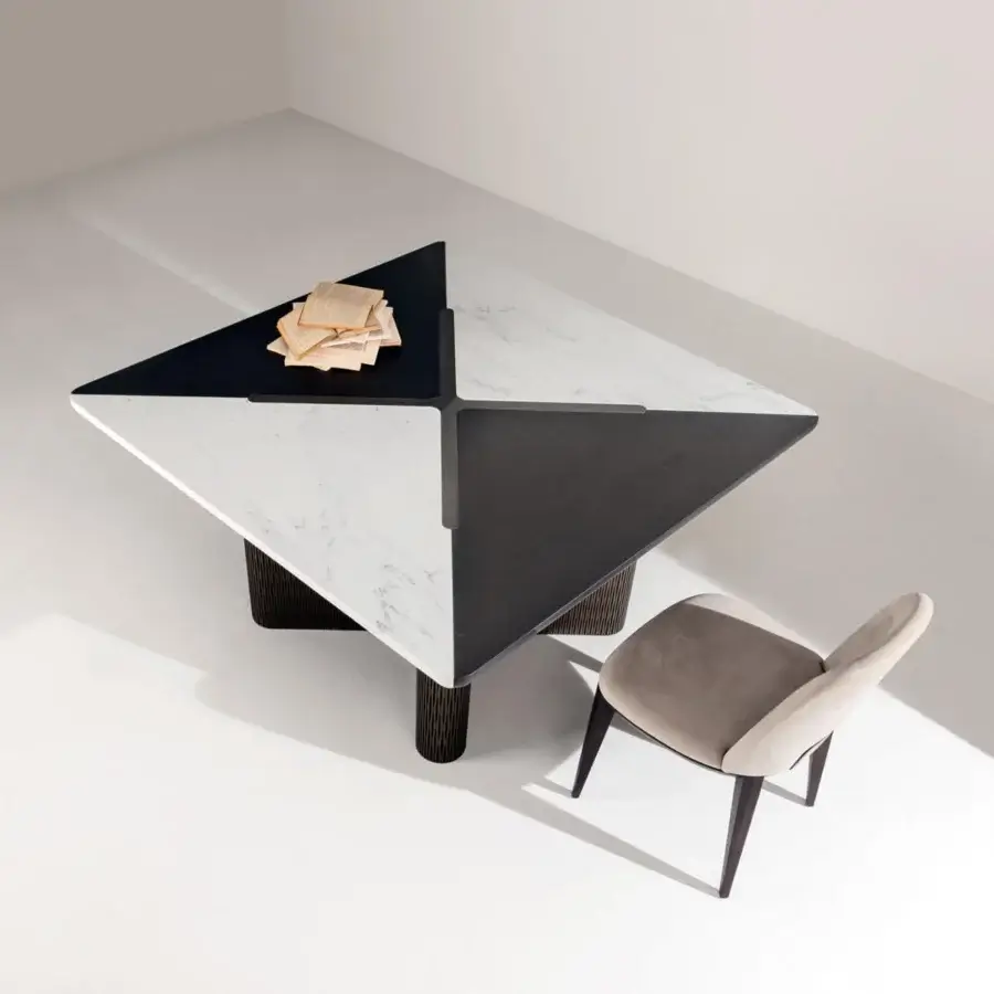 Elegant Laurameroni Infinity Table with veined white marble, dark wood, burnished brass rosette, ribbed legs in tone
