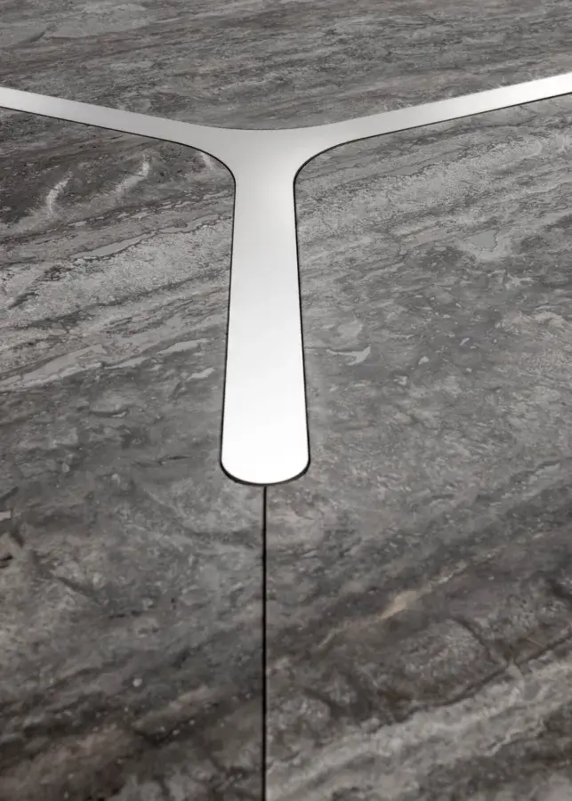 High-end Laurameroni Infinity Air Table with marble tabletop veined grey, charcoal, off‑white, burnished‑brass Y‑shaped inlay, Lacca 61 base