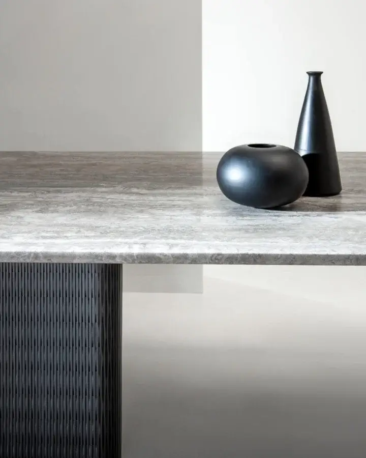 Elegant Laurameroni Infinity Air Table with matte mottled grey marble slab and dark Lacca 61 honeycomb base