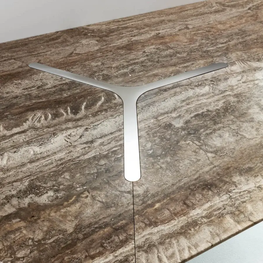 Luxury Laurameroni Infinity Air Table with polished marble top veined earthy browns creams grays and burnished brass Y‑shaped inlay satin finish