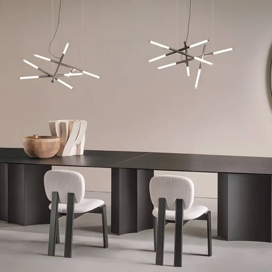 Sophisticated Sovet Italia Willow Cross suspension lamp in dark charcoal matte metal with bright white illuminated tips