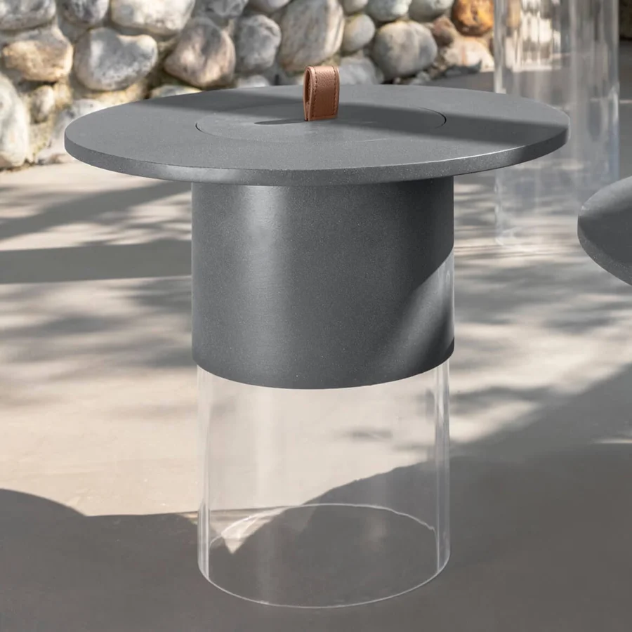 Elegant Talenti Kukà coffee table with dark gray matte synthetic top and clear methacrylate base, brown leather handle
