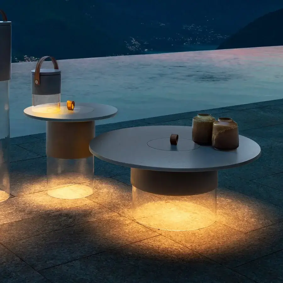 Luxury Talenti Kukà coffee table with matte light‑grey circular top, taupe plus clear methacrylate base, lid and handle