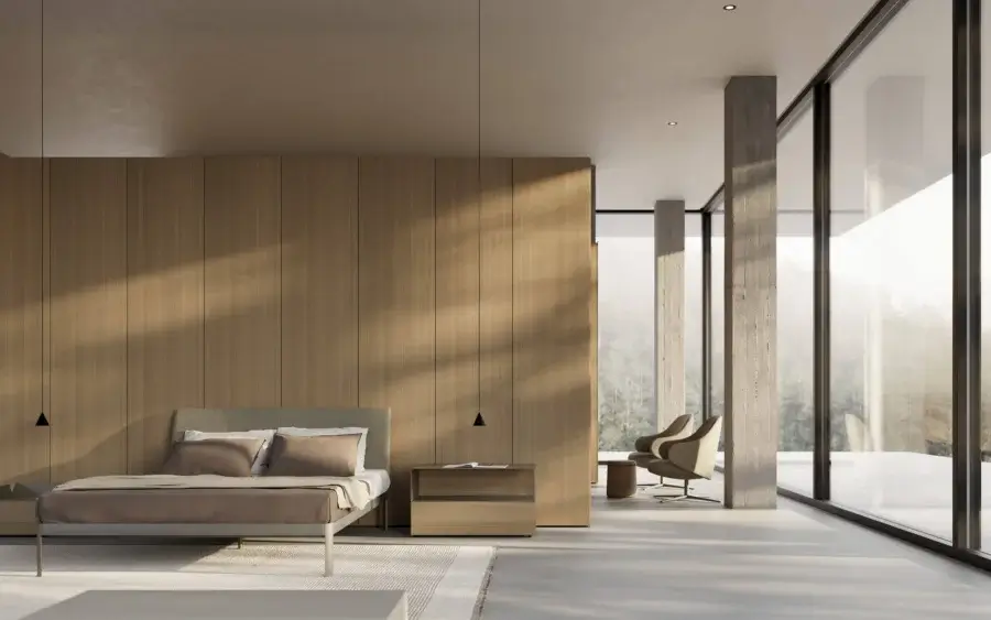 Architectural Kristalia AluAlu bed in light gray metal with a muted taupe padded textile headboard and slender legs