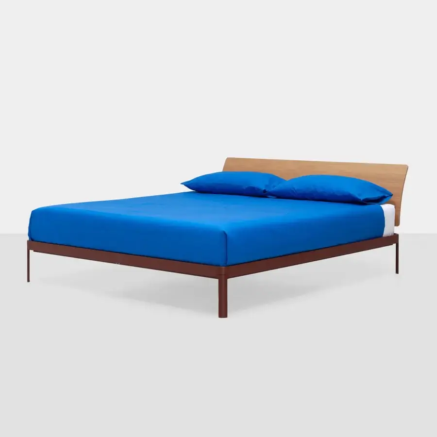 Luxury Kristalia AluAlu Bed low‑profile rectangular silhouette with grain headboard and dark brown copper-toned metal frame