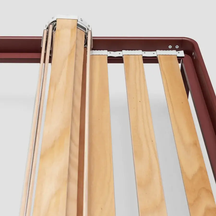 Prestige Kristalia AluAlu Bed with burgundy matte metal rail and light natural wood slats secured by white synthetic caps