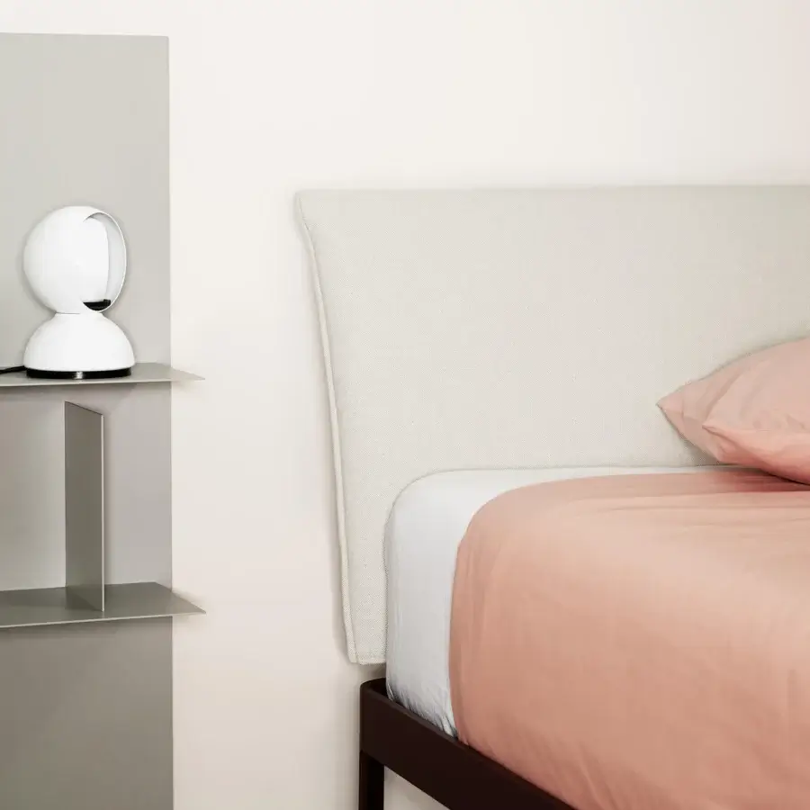 Elegant Kristalia AluAlu Bed with powder‑coated aluminum frame, off‑white woven headboard, minimalist contemporary design