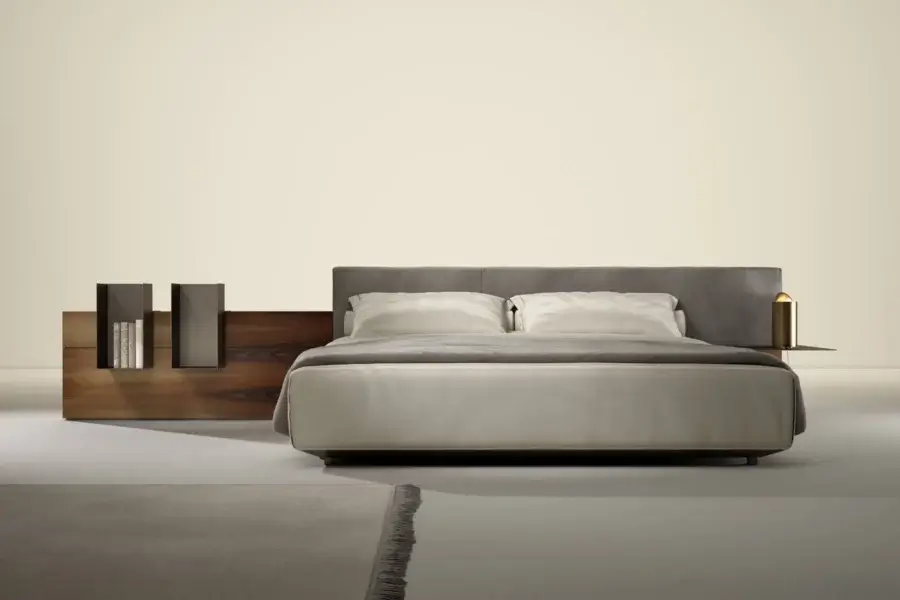 Sophisticated Laurameroni Symphony bed with neutral textile, black aniline-dyed base and matte wood frame