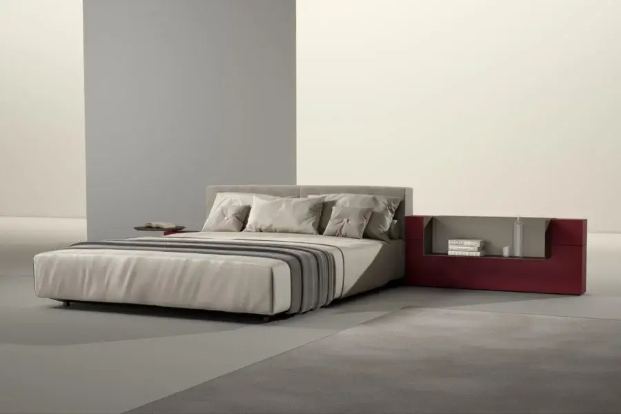 Elegant Laurameroni Symphony bed with black aniline‑dyed wood base, velvet headboard, and beige/cream textile frame