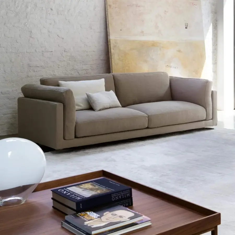 Lavish Swan Italia Host sofa with taupe velveteen upholstery and gently rounded armrests built with a wooden frame