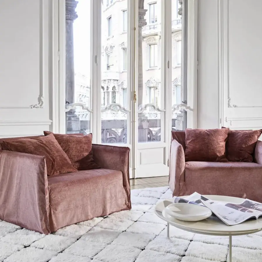 Elegant Gervasoni Ghost lounge chair with muted dusty rose ribbed textile, polyurethane foam, plush Dacron, down cushions